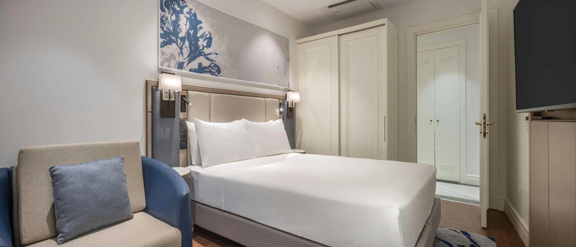 Hilton Mall Of Isztambul Kültér fotó A bedroom at the hotel